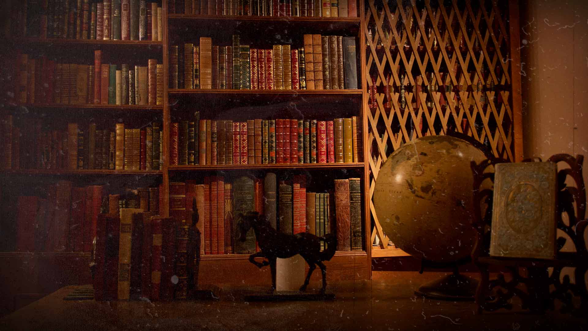 Bibliothèque ancienne avec globe terrestre pour un escape game mystère