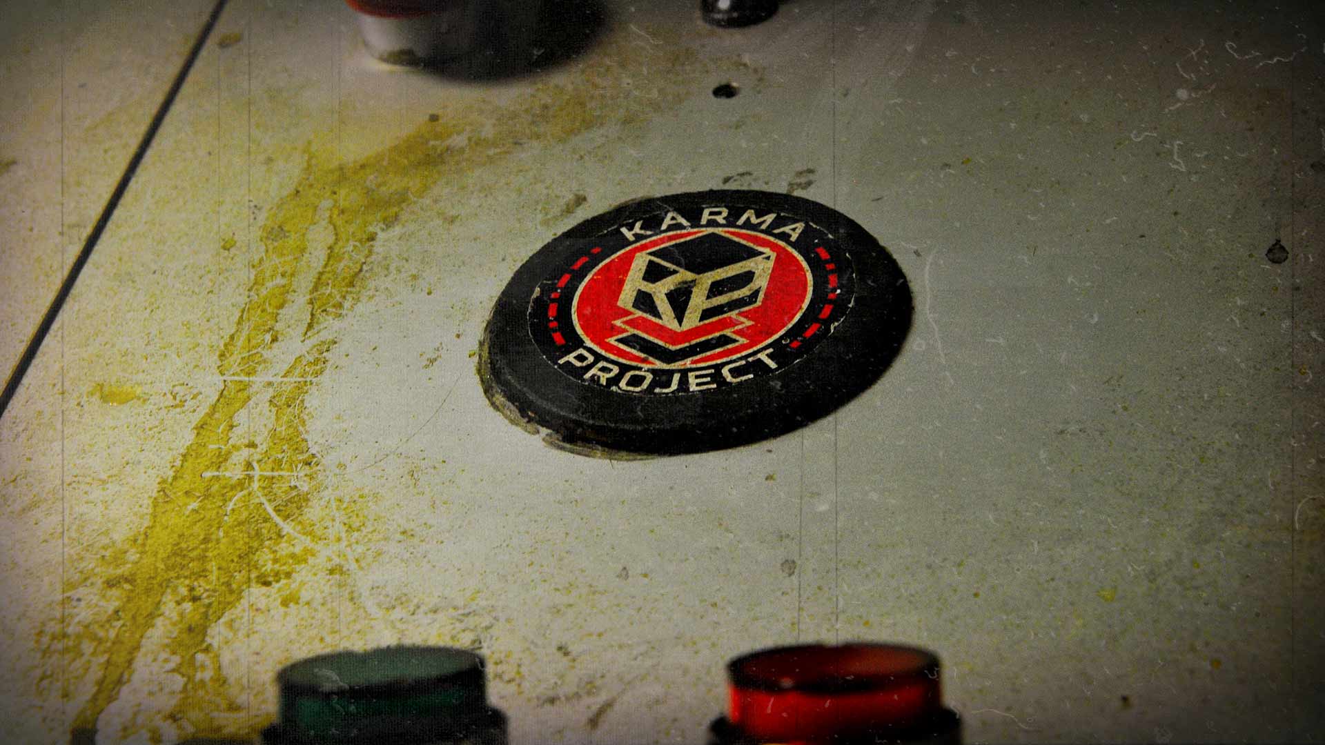 Logo Karma Project sur une console de jeu escape game